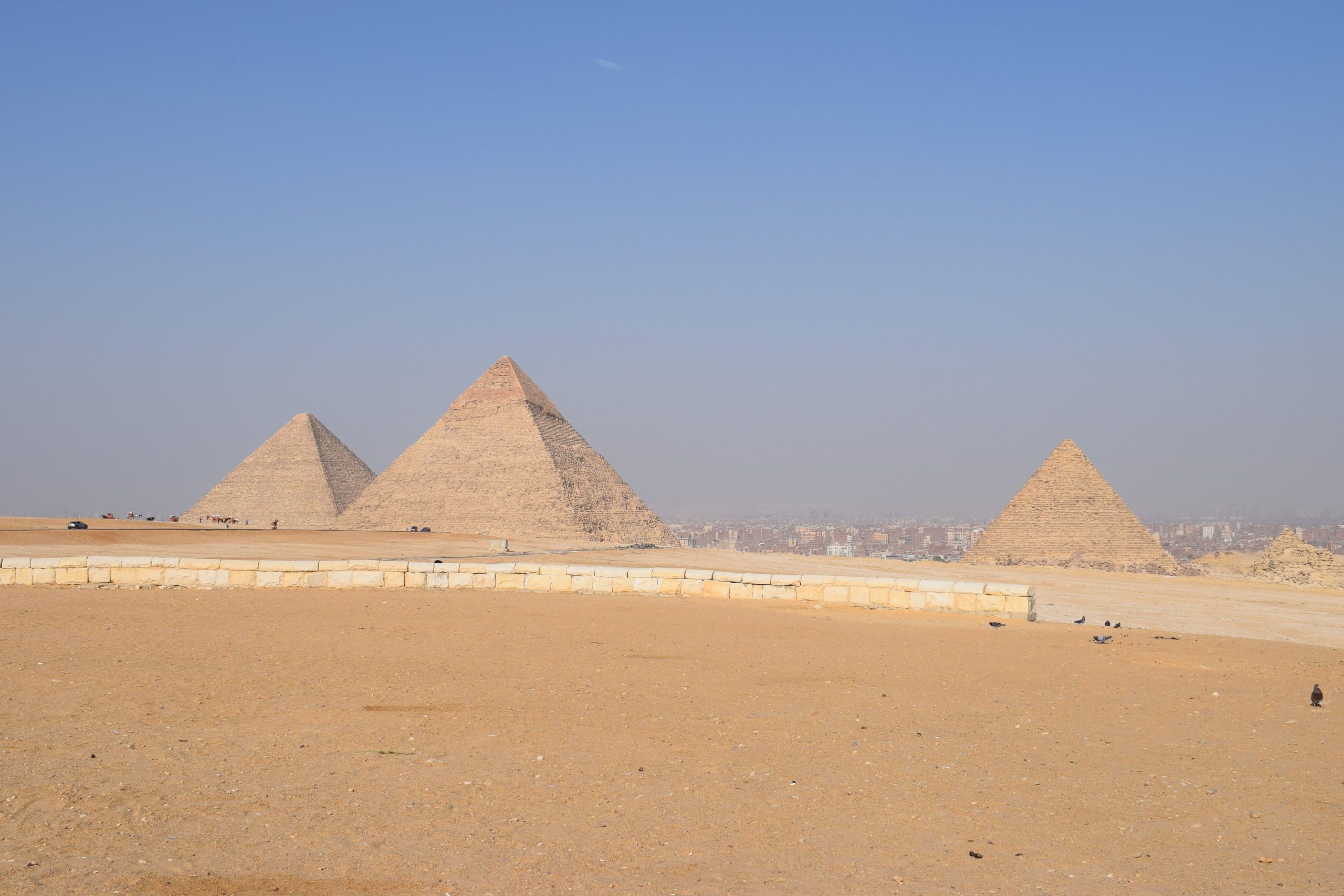 The Giza Pyramids rise above the desert outside Cairo, a landmark stop on a two-week Egypt itinerary.